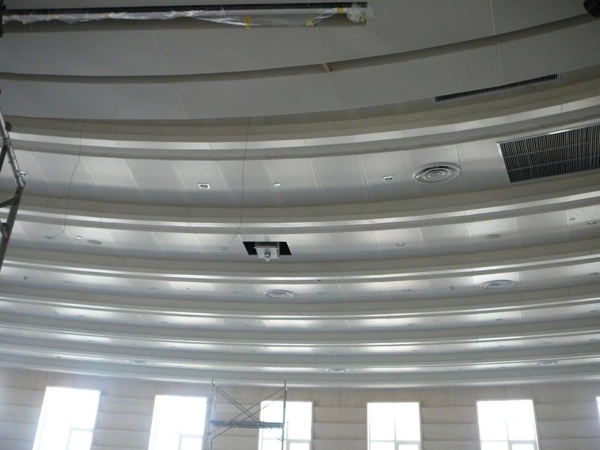 Punched aluminum veneer