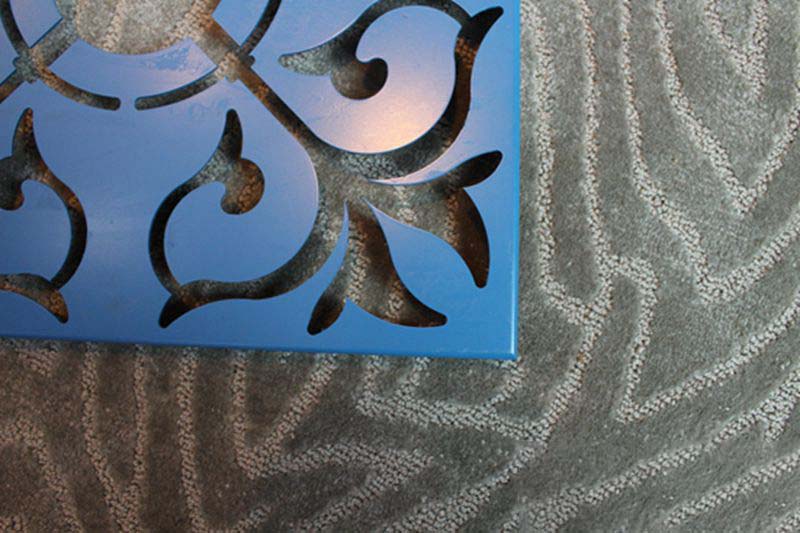Carved aluminum veneer